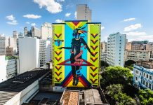 Mural em grafite, feito pela artista Criola, representa simbologias da cultura afro-brasileira