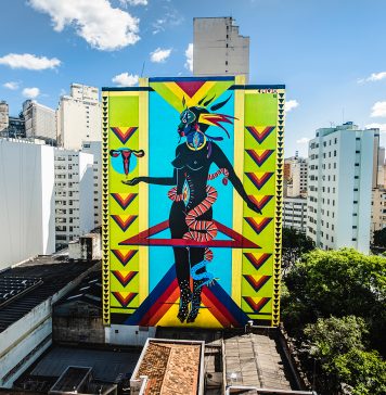 Mural em grafite, feito pela artista Criola, representa simbologias da cultura afro-brasileira