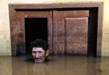 João Pereira de Araújo photographed by Gideon Mendel for his "Submerged Portraits" series.